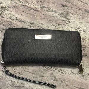 Michael Kors Textured Black Wristlet. Listing will be removed 2/6/26.